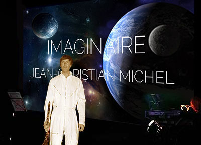 Jean-Christian Michel concert interstellaire devant écran géant